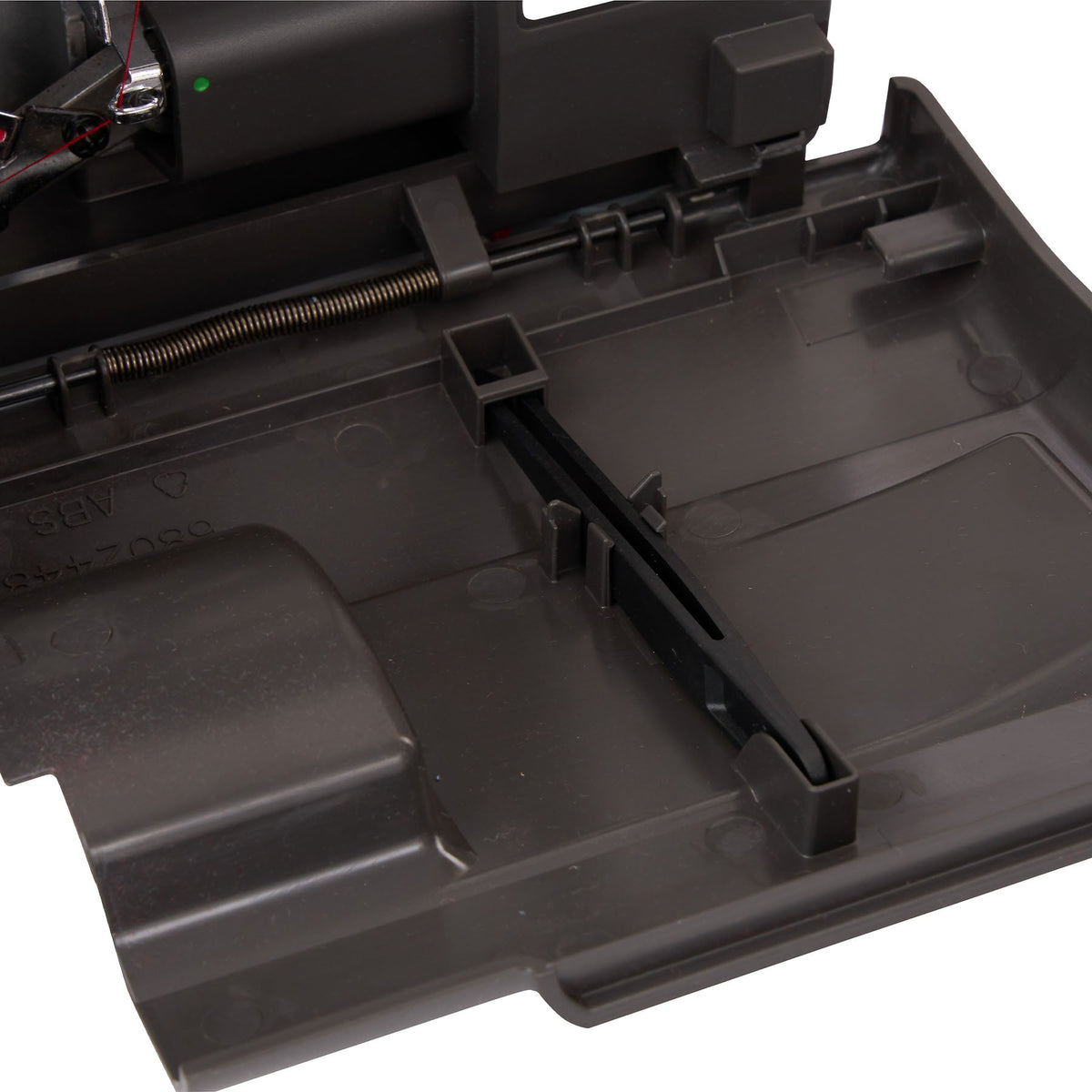 Singer HD0460 serger open lower compartment with a plastic tray