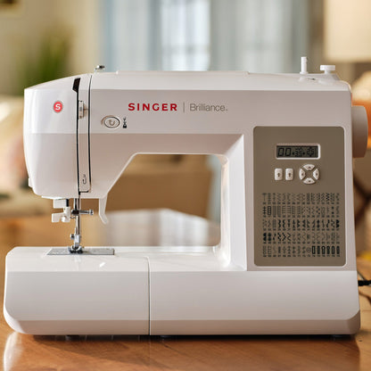Singer Brilliance 6180 sewing machine with LCD screen and stitch chart