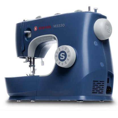 Singer M3330 blue sewing machine angled front view with stitch selector dial and free arm