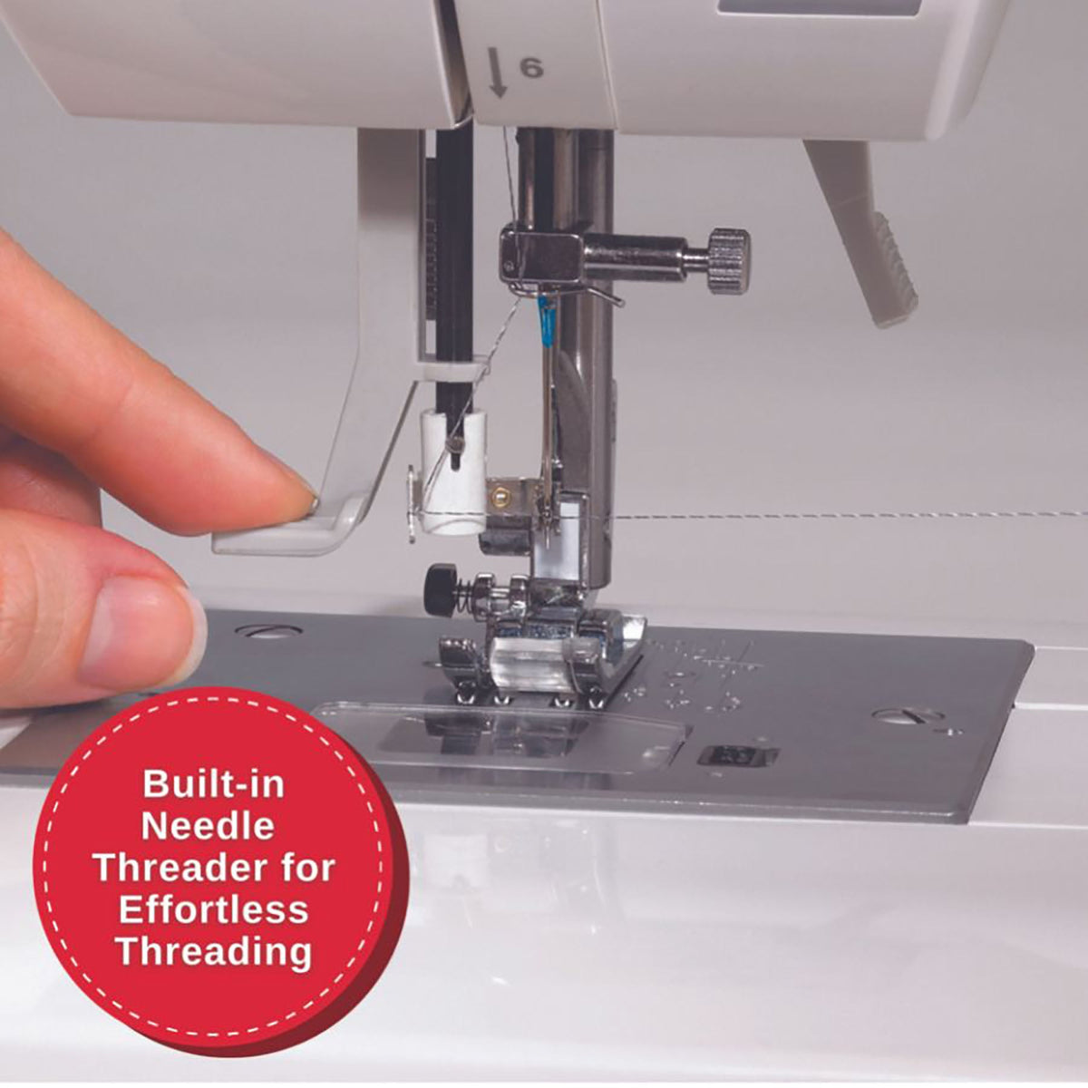 Singer C7290Q needle threader in use