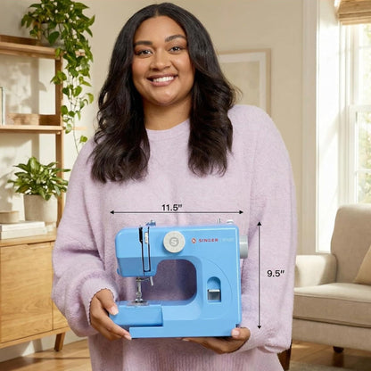 Singer M1000 Blue mending machine held in two hands