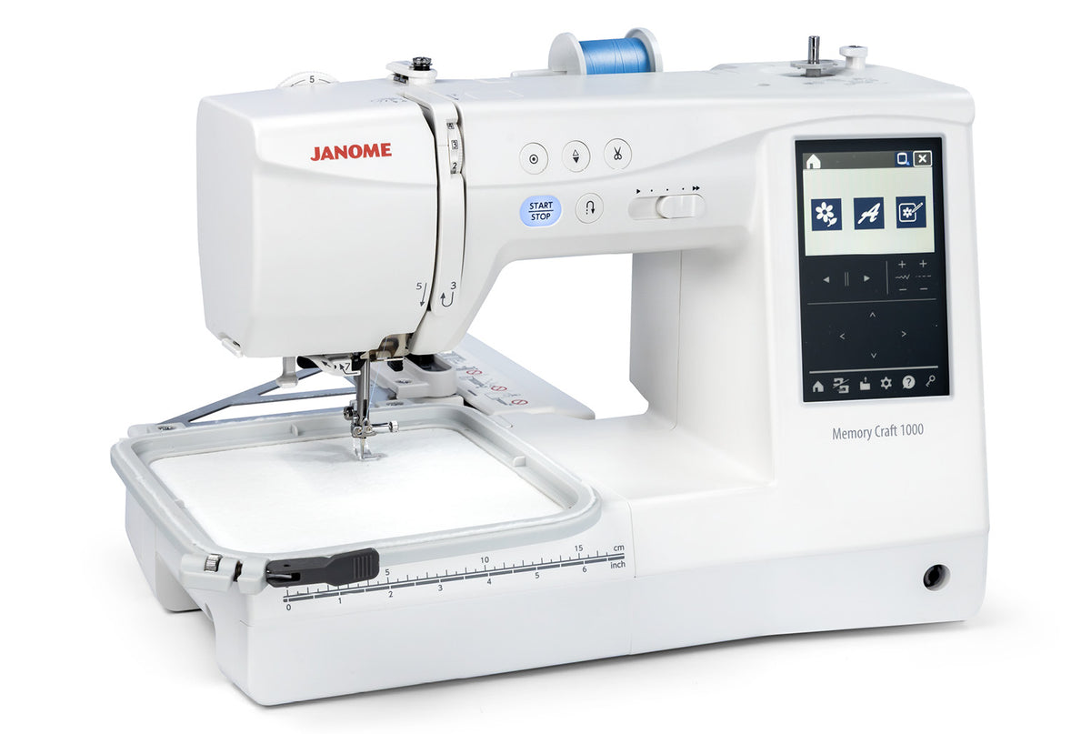 Janome Memory Craft 1000 with the SQ14e embroidery hoop attached