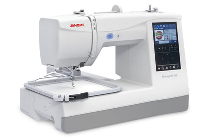 Janome Memory Craft 100E with the SQ14e embroidery hoop attached