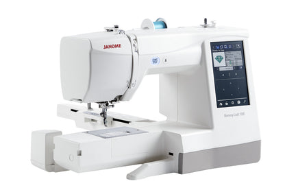 Janome Memory Craft 100E angled view with embroidery arm