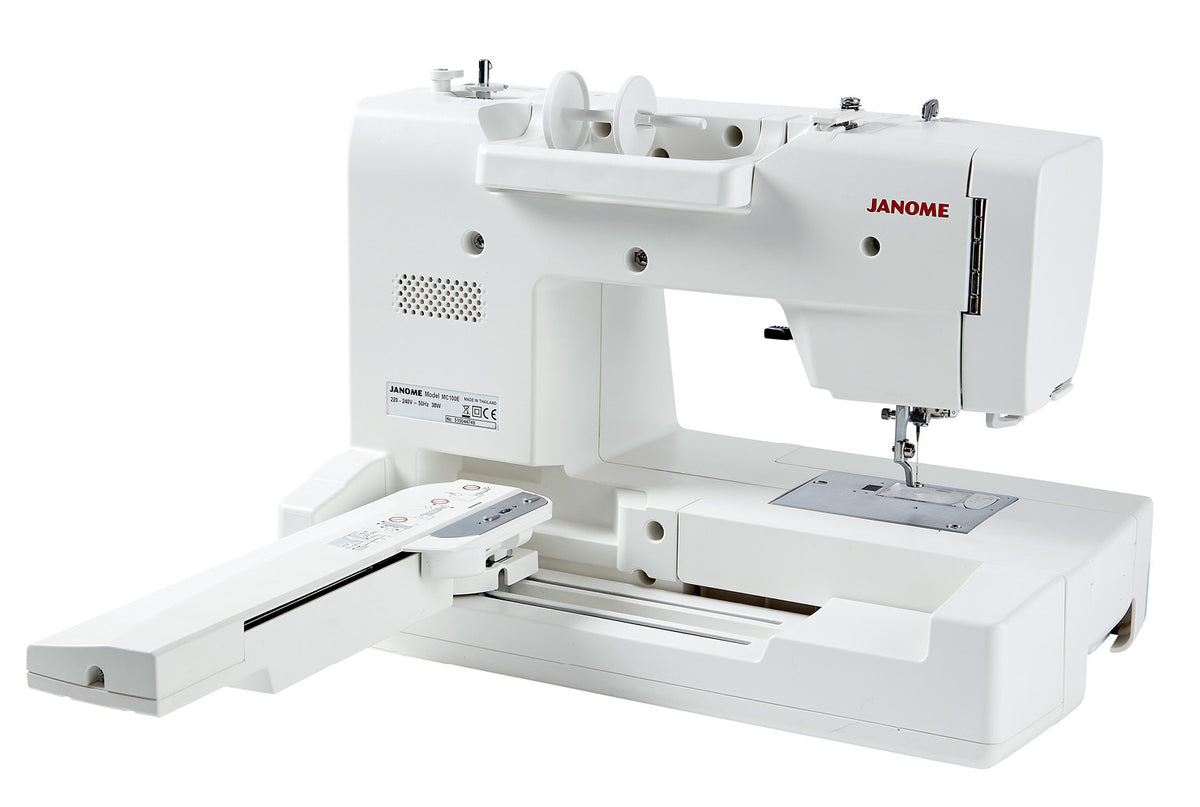 Janome Memory Craft 100E rear view with the embroidery unit extended