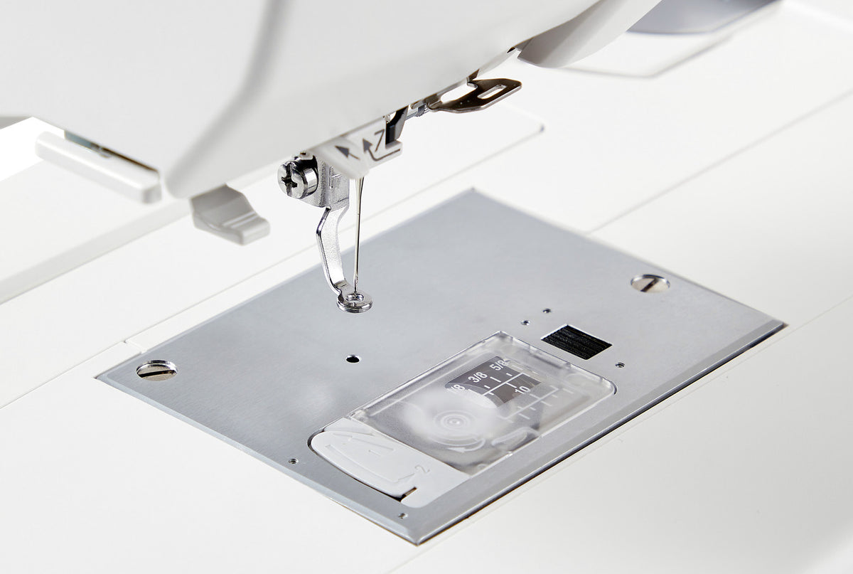 Janome Memory Craft 100E needle plate and bobbin cover