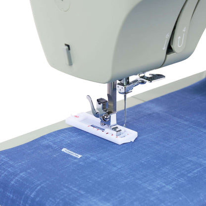 Singer Heavy Duty 4511 Sage buttonhole foot on blue fabric