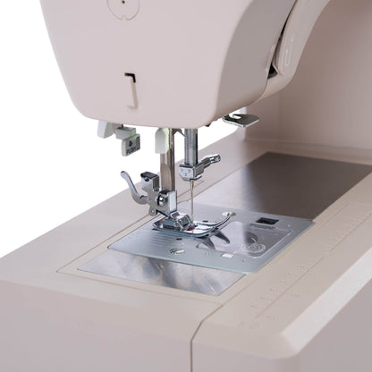 Singer Heavy Duty 4523 needle plate and stainless steel bedplate with the presser foot attached