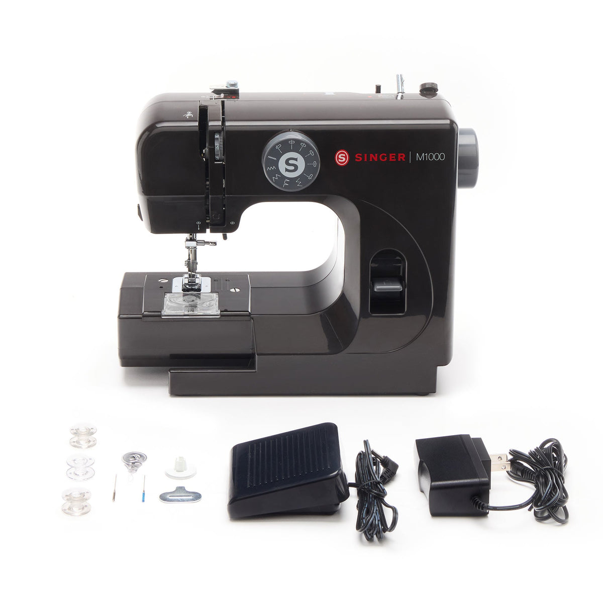 Singer M1000 Black with its bobbins, needles, needle threader, foot switch, and AC adapter
