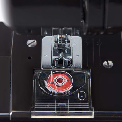 Singer M1000 Black top-loading bobbin under a transparent cover