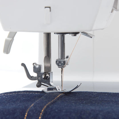 Singer Prisma Heavy Duty needle and presser foot stitching through denim fabric