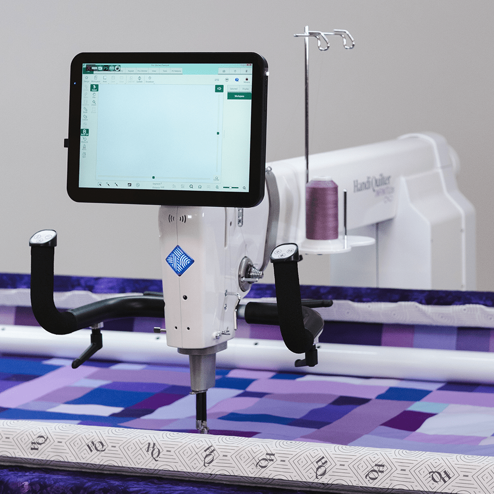 Handi Quilter Infinity 28 longarm machine side angle