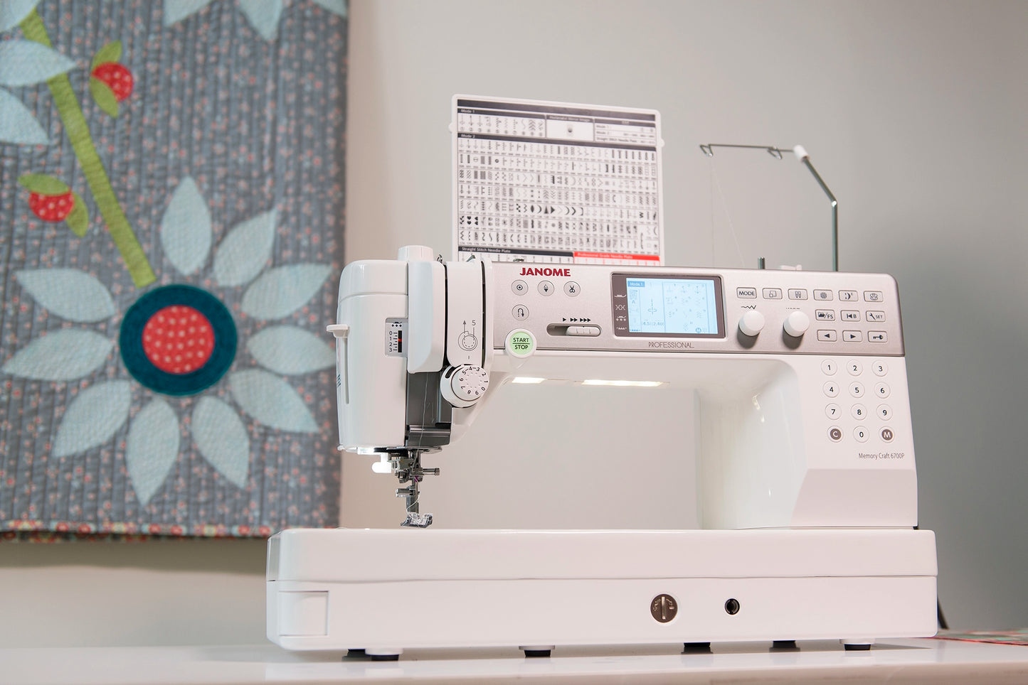 Janome Memory Craft 6700P Sewing and Quilting Machine