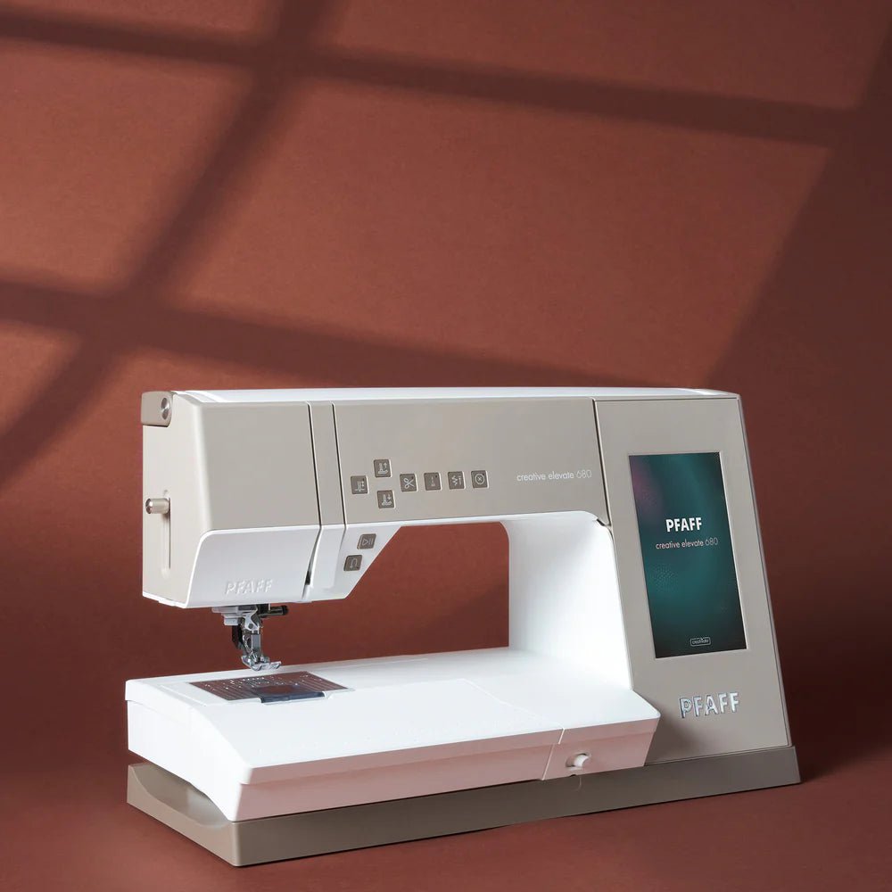 Pfaff Creative Elevate 680 sewing machine showing touchscreen and workspace