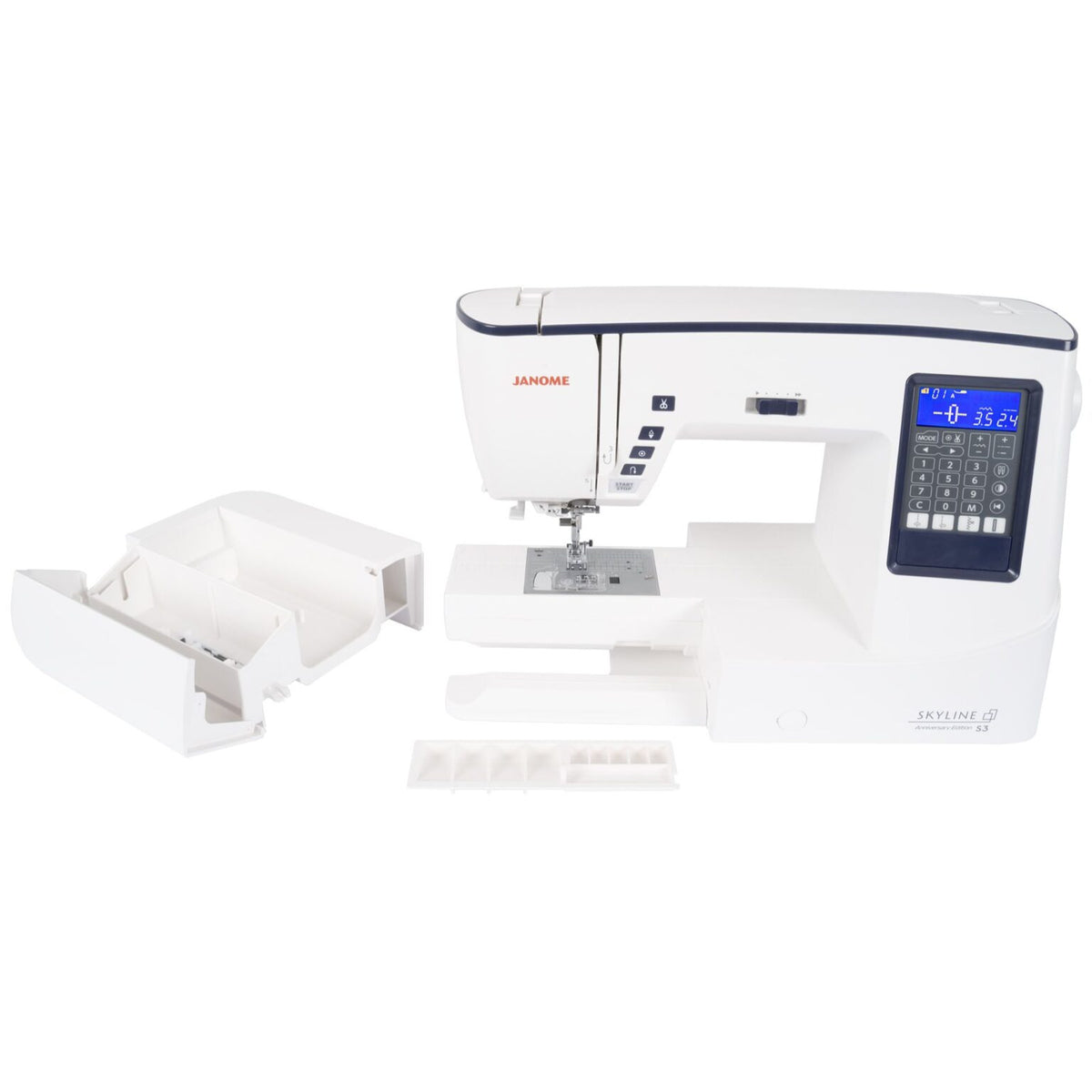 Janome Skyline S3 Anniversary Edition with the accessory storage box removed from the free arm and opened beside the machine