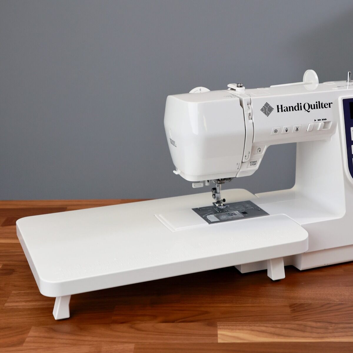https://www.qualitysewing.com/cdn/shop/products/hq_stitch_310_sewing_machine_with_extension_table_ae0c26c0-5699-489c-b705-fb1b32d535e6.jpg?v=1697126150&width=1445